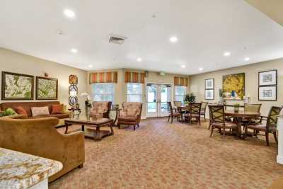 A cozy living room with comfortable seating and warm lighting.