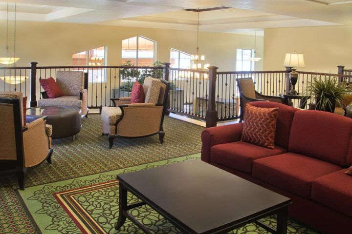A cozy living room with comfortable sofas and elegant interior design.