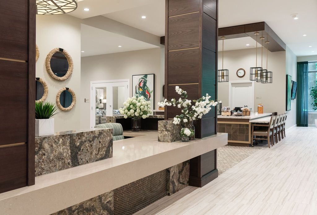 A modern lobby area with stylish decor and lighting.
