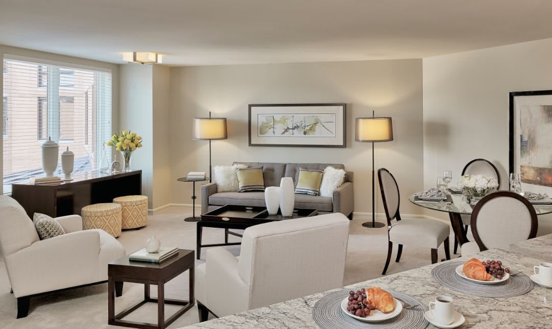 A modern living room with sleek furniture and elegant decor.