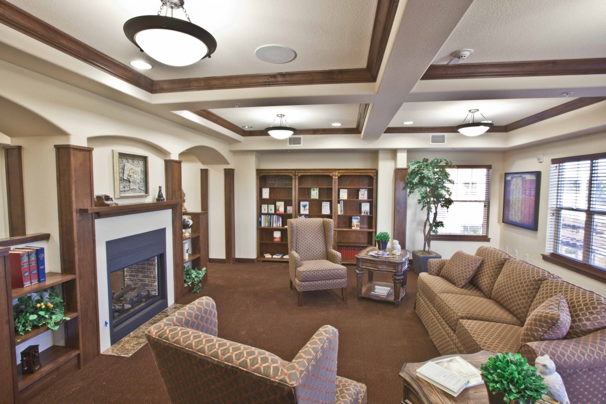 Cozy living room with comfortable seating and a fireplace.