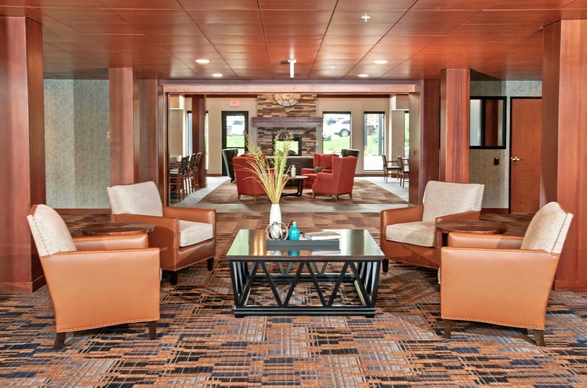 A modern lobby with comfortable seating and stylish decor.
