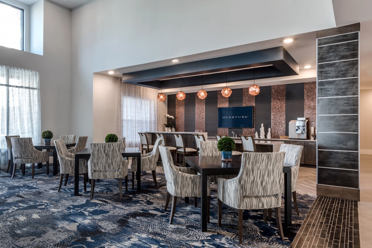 A modern hotel lobby with comfortable seating and stylish decor.