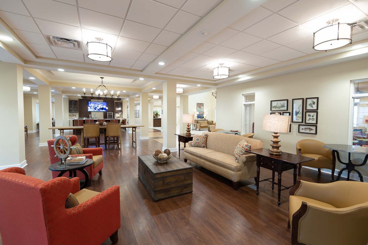 A spacious and elegantly designed lounge area with comfortable seating and stylish decor.