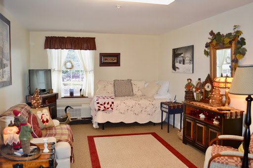 A cozy and inviting living room with traditional decor elements.