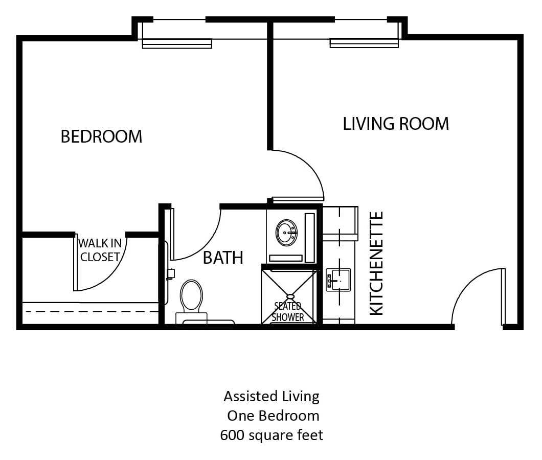 This image shows a floor plan for a one-bedroom assisted living unit, featuring a bathroom, kitchenette, and living room.