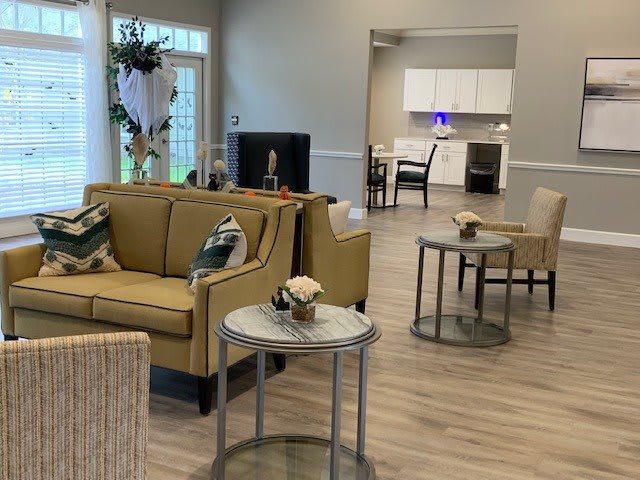 A modern living room with comfortable sofas and stylish tables.