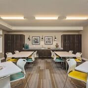 A modern classroom with stylish furniture and decor.