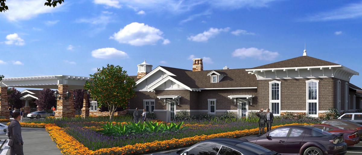 A suburban home with a well-maintained garden under a clear blue sky.