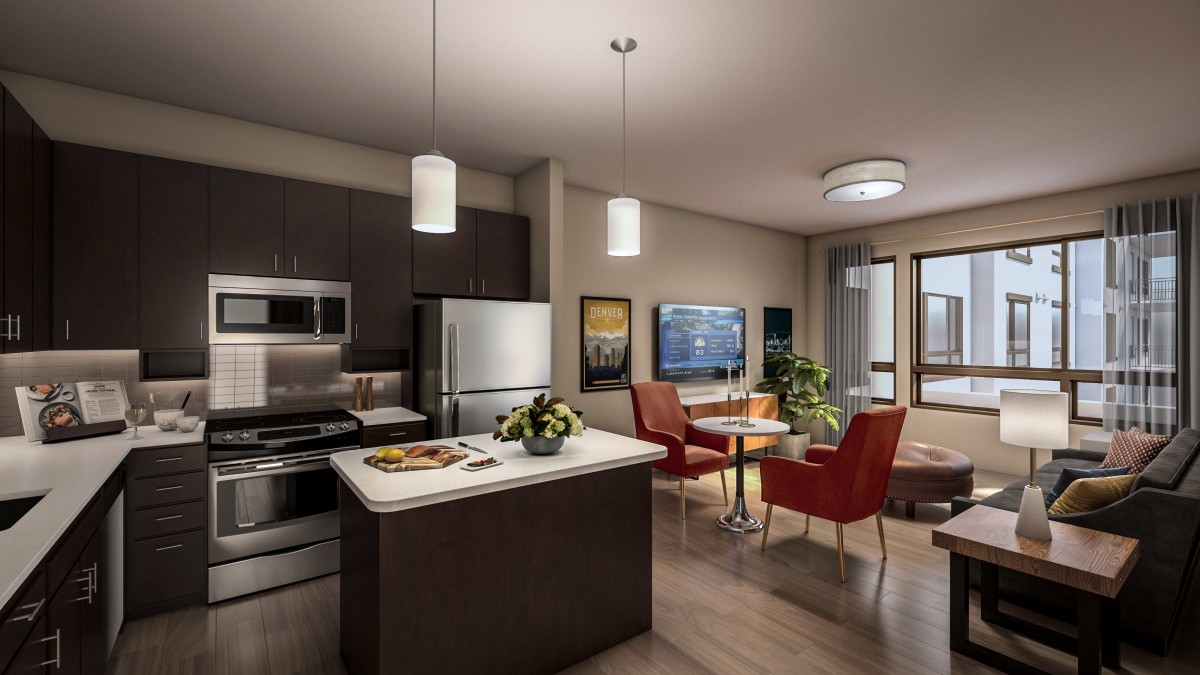 A modern open-plan kitchen and living area featuring stylish furniture and contemporary appliances.