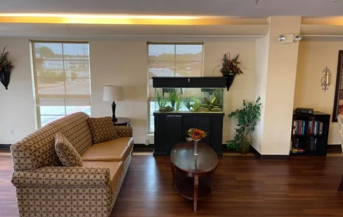 Cozy living room with an aquarium centerpiece and stylish decor.