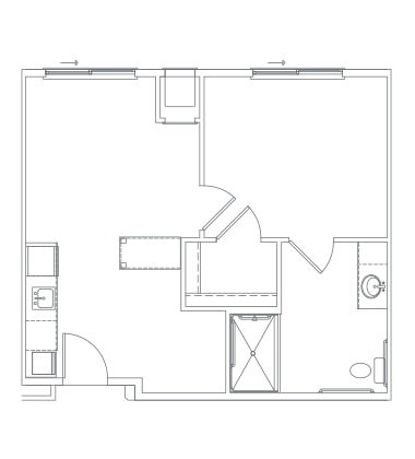 A simple architectural floor plan showing the layout of a room with designated areas for a kitchen, bathroom, and living space.