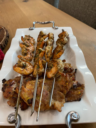 A delicious platter of grilled chicken kebabs served with savory spices.