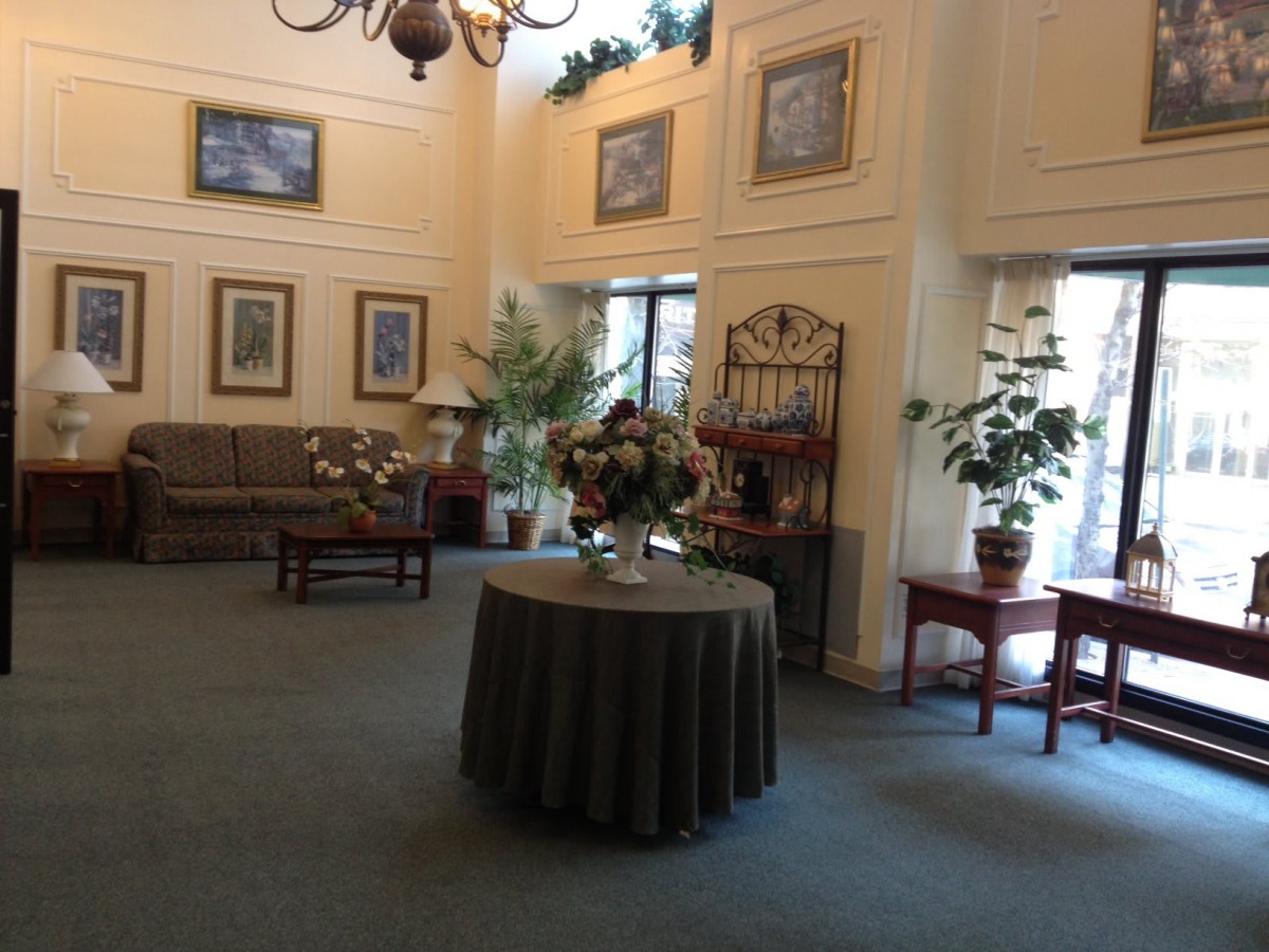 A well-decorated lobby with comfortable seating and elegant decor.