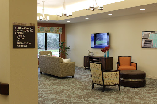A cozy and modern living room with comfortable seating and a television.