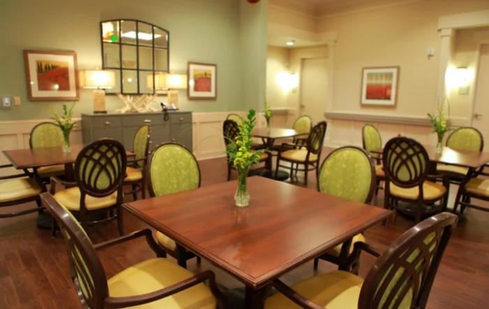 A cozy dining area with elegant furniture and tasteful decor.