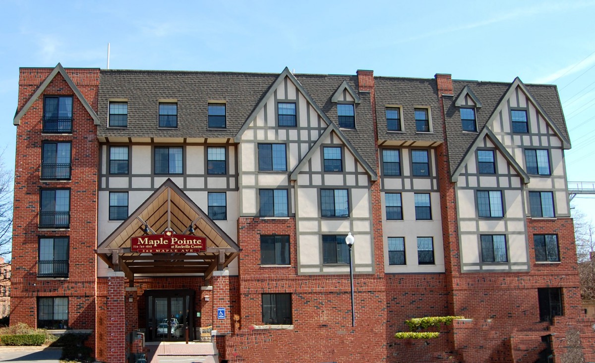 A Tudor-style hotel with a brick exterior.