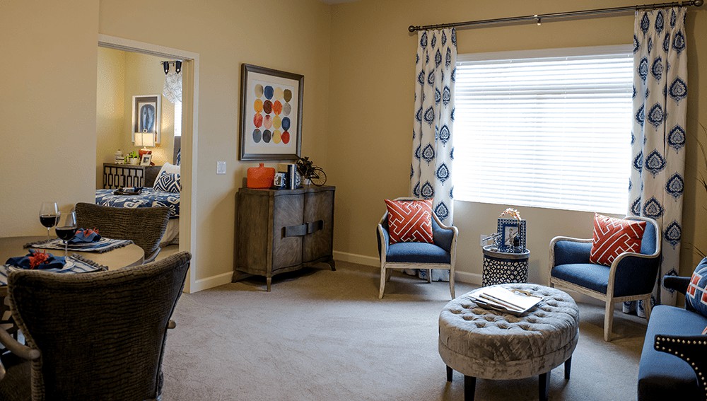 A cozy living room with comfortable seating and modern decor.