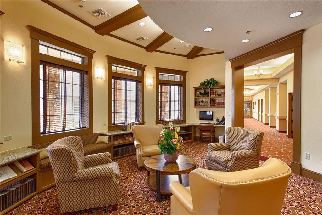 Cozy lobby area with comfortable seating and warm lighting.