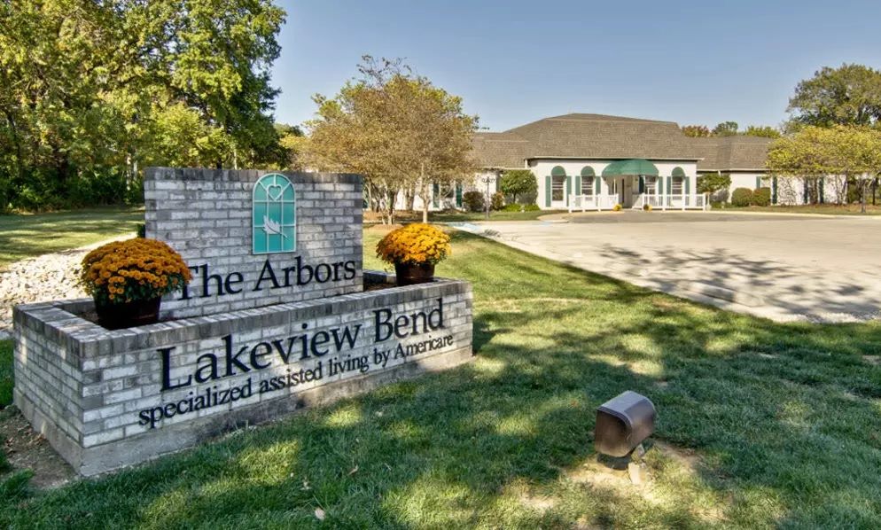 Entrance to Lakeview Bend assisted living facility with sign and landscaping.