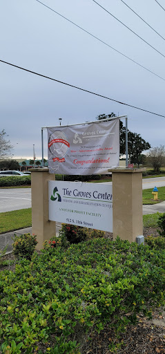 A sign for The Care Center, featuring an announcement banner.