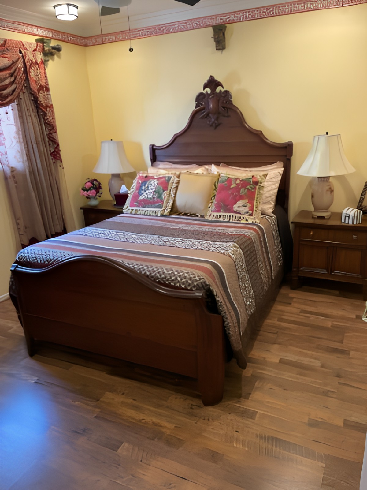 A cozy bedroom with a wooden bed and elegant decor.