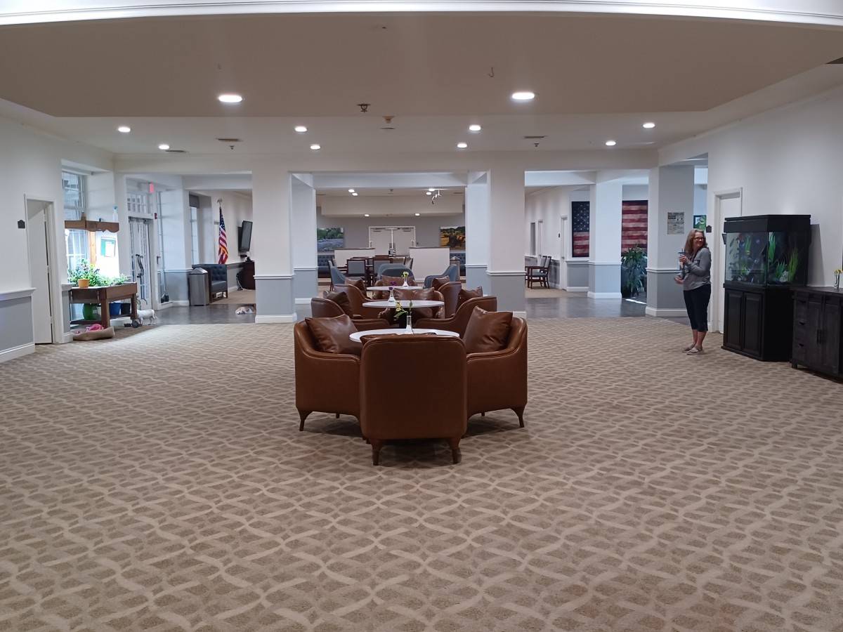 Spacious lounge area with comfortable seating and elegant decor.