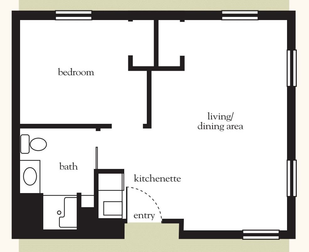 Floor plan of a one-bedroom apartment with a living/dining area, kitchen, and bathroom.