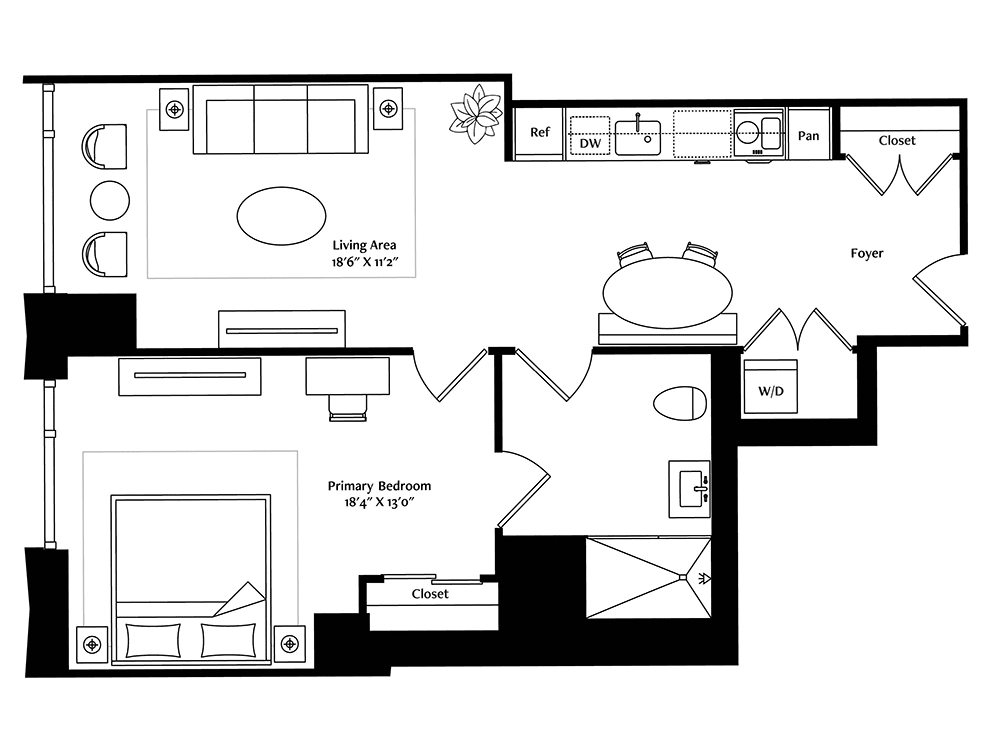 A floor plan of a one-bedroom apartment featuring a living room, kitchen, dining area, and bathroom.