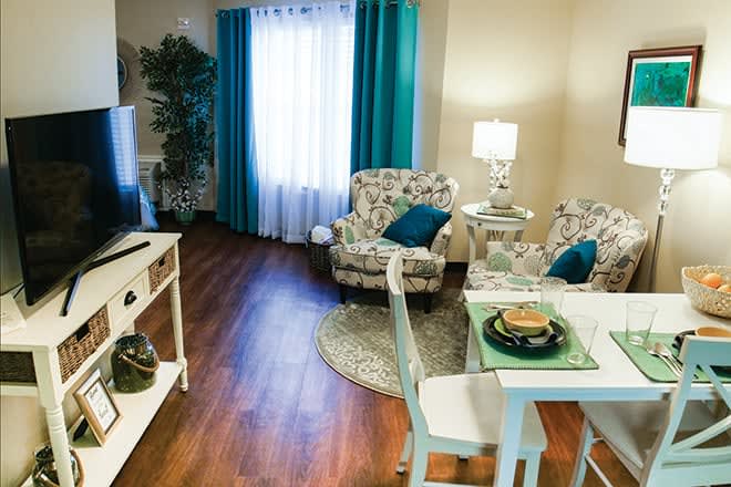 A cozy living room with elegant decor and comfortable furnishings.
