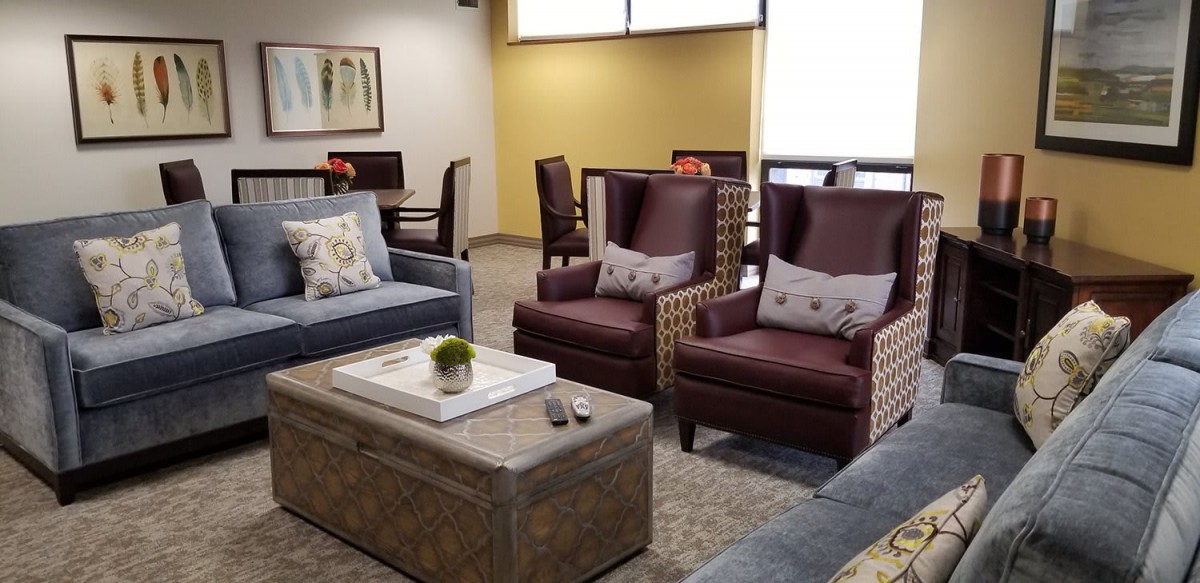 A cozy living room with comfortable seating and modern decor.