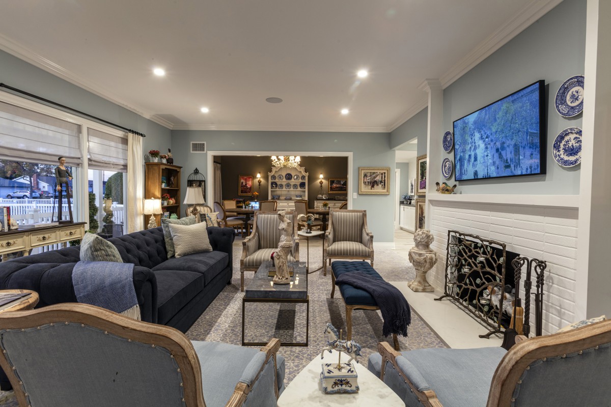A beautifully decorated living room with elegant furniture and a cozy ambiance.