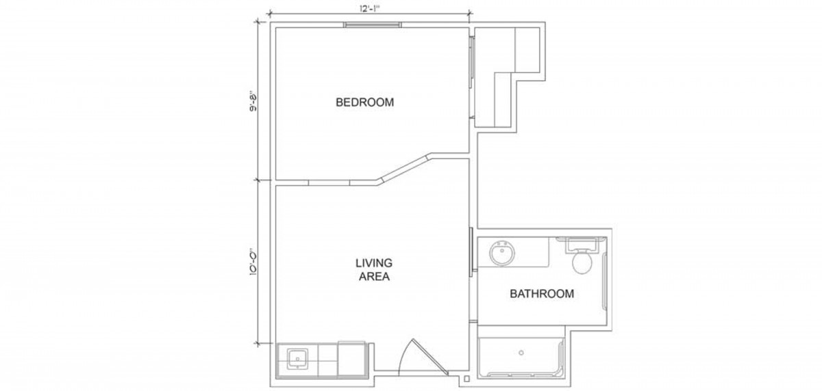 Blueprint of a small apartment with a bedroom, living area, and bathroom.