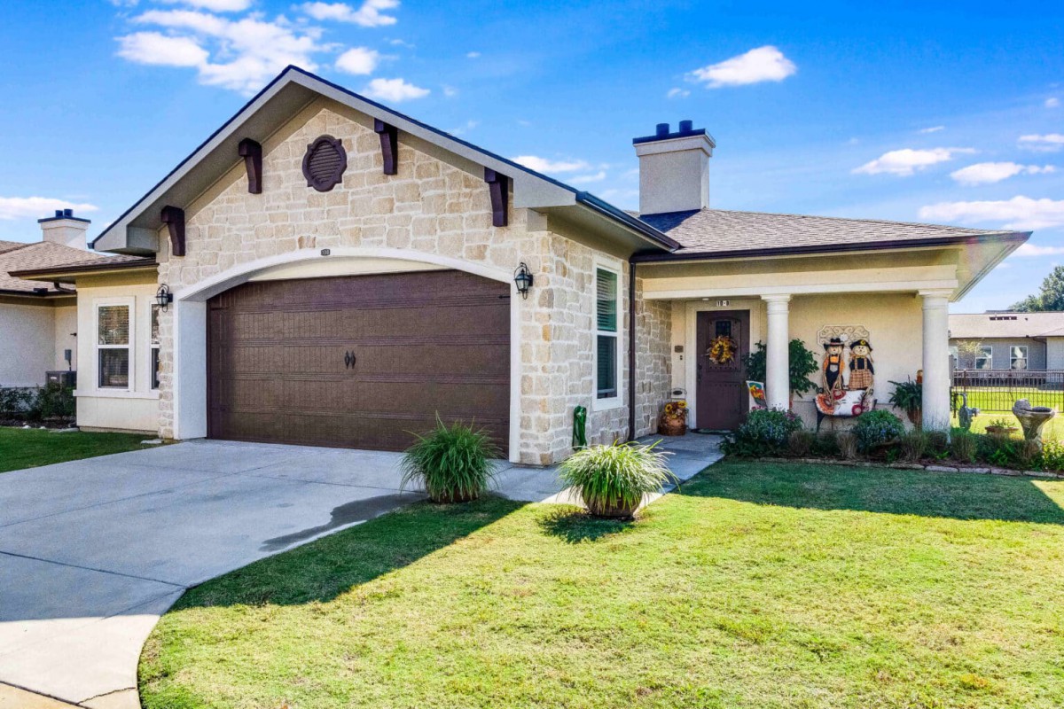 Exterior view of building and garage.