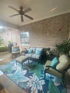 A cozy outdoor patio with comfortable seating and vibrant decor.
