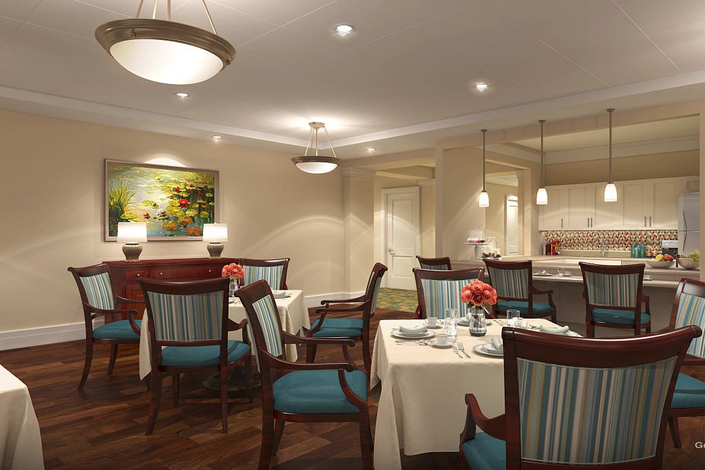 A well-decorated dining area with elegant furniture and ambient lighting.