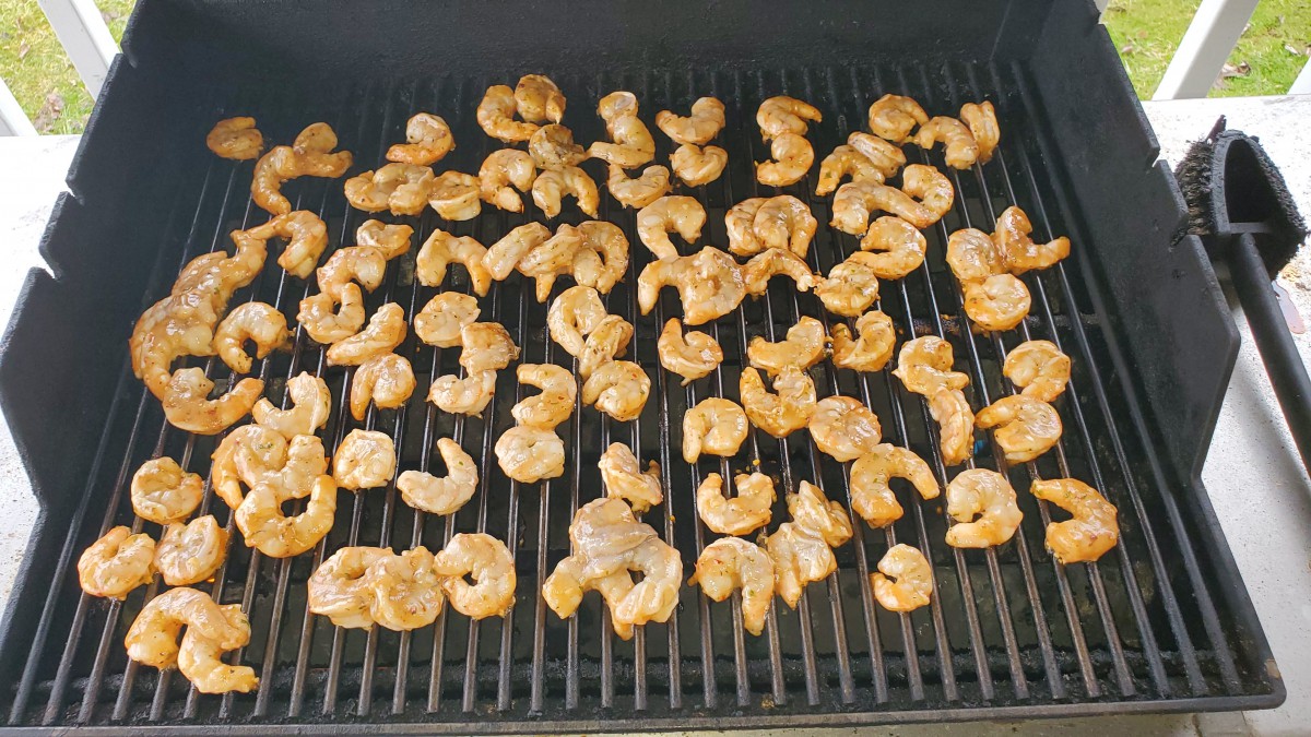 Shrimp being grilled on a barbecue.