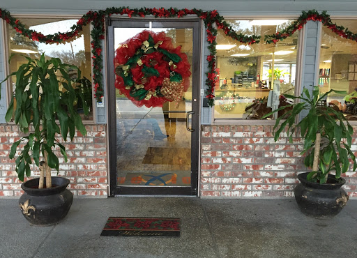 A beautifully decorated door with a festive wreath for the holiday season.