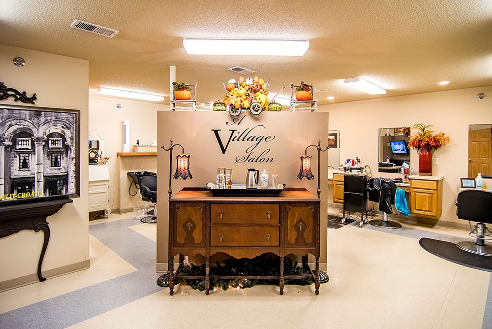 A vintage-themed salon interior with classic furniture and decor.