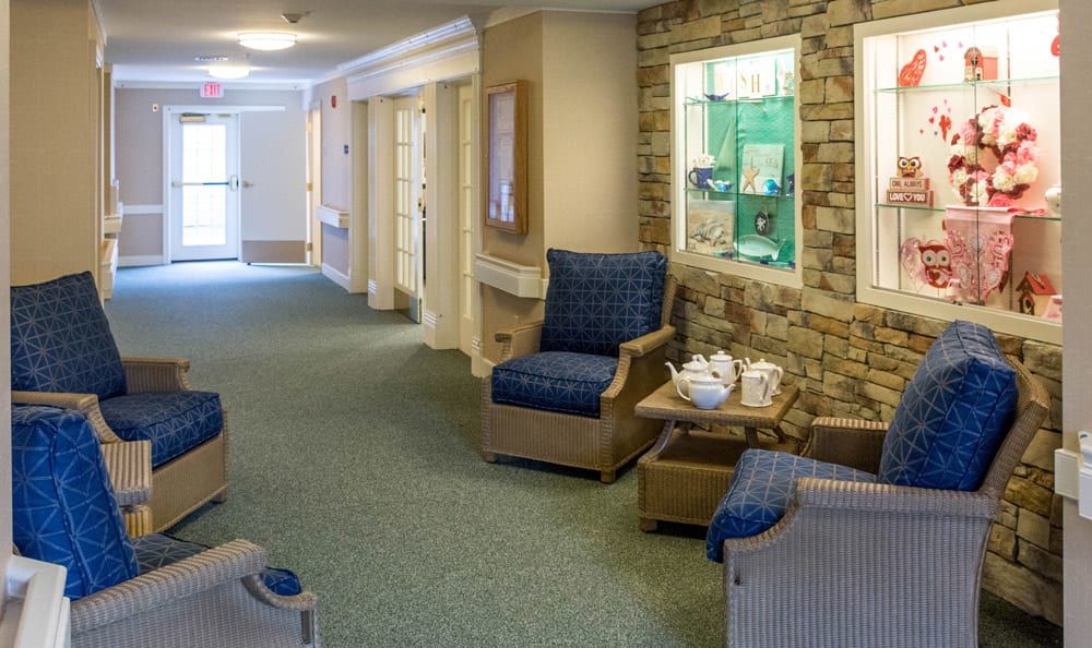 A cozy hallway with armchairs and decorative elements.