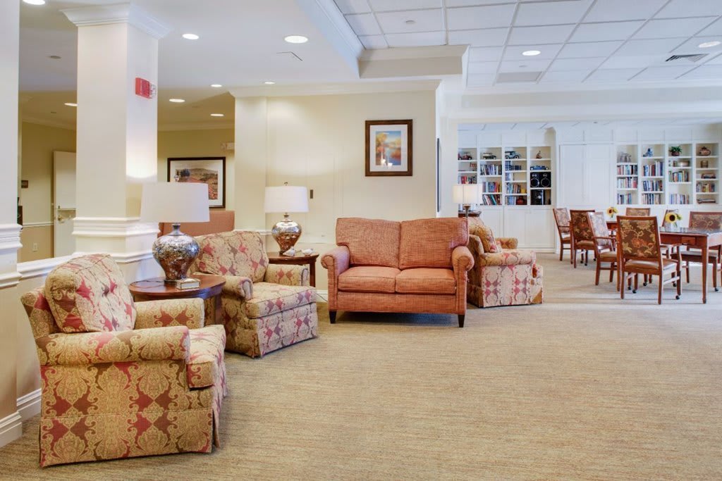 A cozy hotel lobby with comfortable seating and warm lighting.