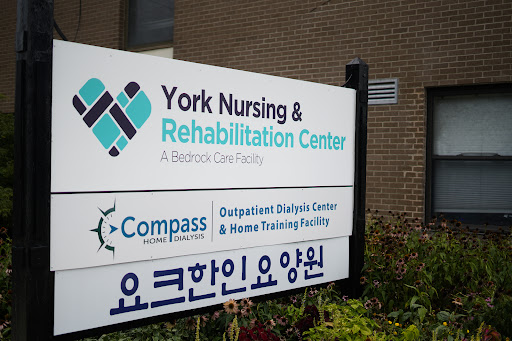 Signage for York Nursing & Rehabilitation Center, highlighting its services.
