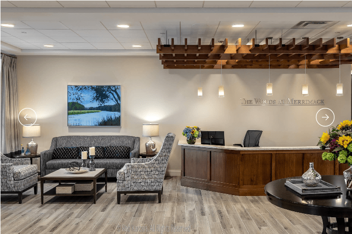 A modern reception area with comfortable seating and elegant decor.