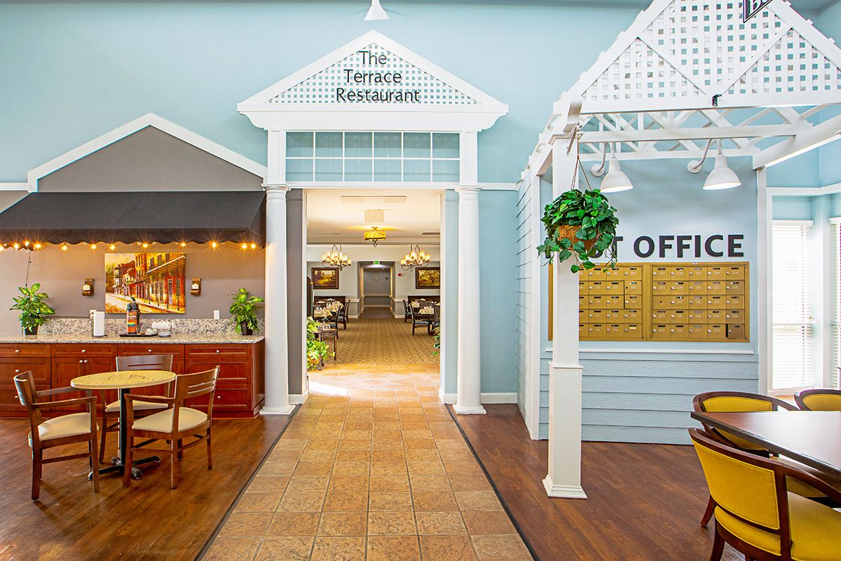 A welcoming restaurant entrance with adjacent post office interior.