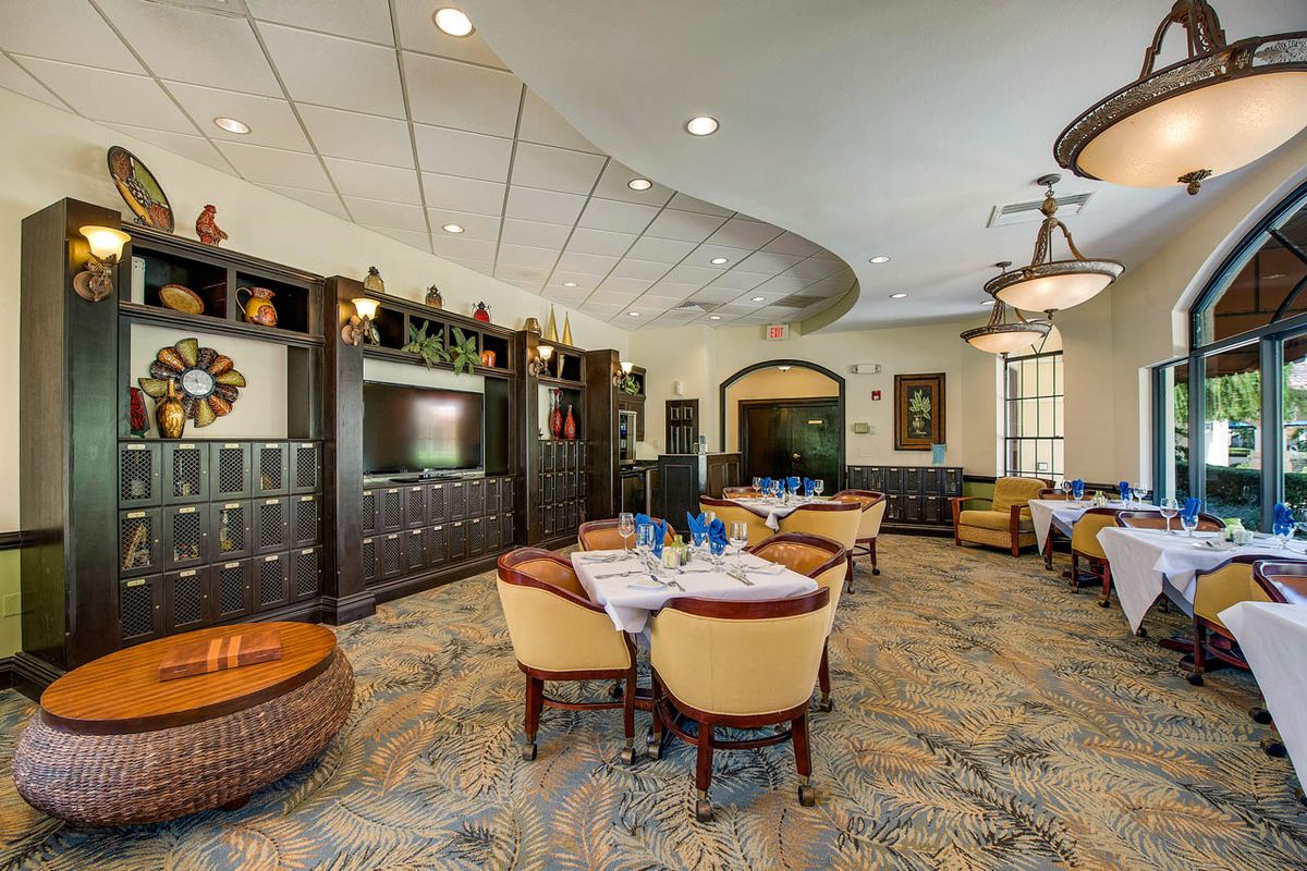 A well-designed dining area with modern decor and elegant table settings.