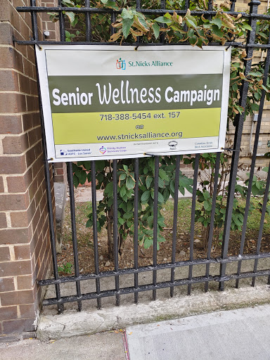 A banner promoting a Senior Wellness Campaign, encouraging health and support for seniors.