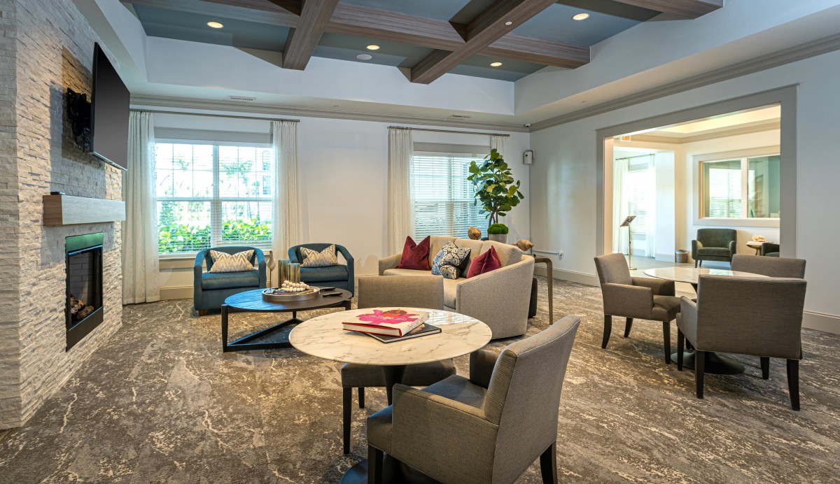 A modern living room with comfortable seating and stylish decor.