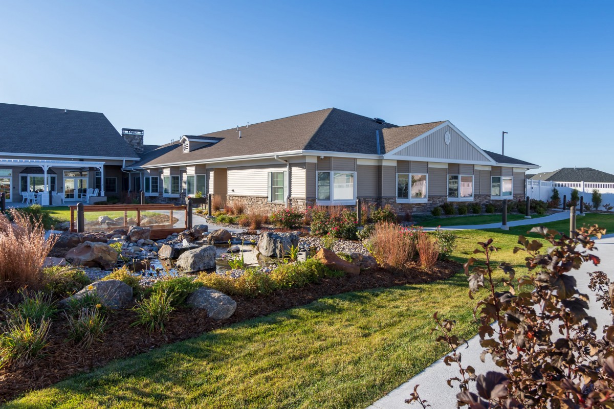 A well-maintained suburban house with a landscaped garden.