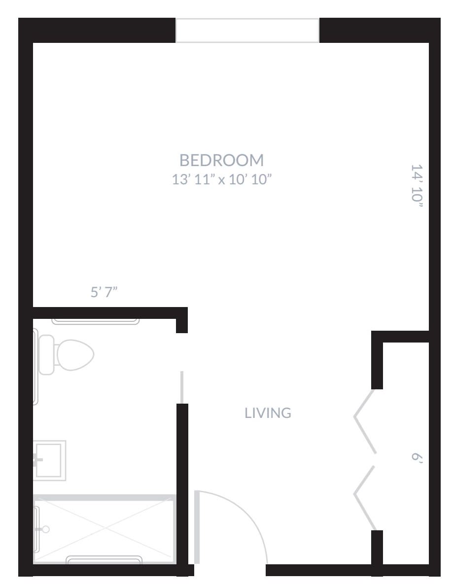 A simple floor plan showing a layout with a bedroom, bathroom, and living area.