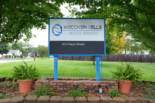 Sign for Wisconsin Dells Health Services located on Pascal Street.
